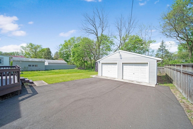detached garage with fence