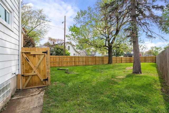 2671 Whitehead Rd, Columbus, OH 43204 - view of yard with a gate and a fenced backyard