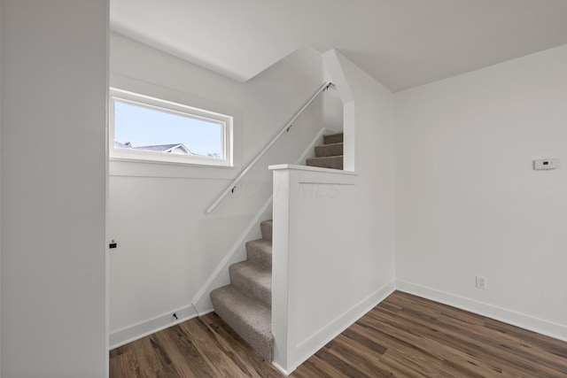 2671 Whitehead Rd, Columbus, OH 43204 - stairway featuring baseboards and wood finished floors