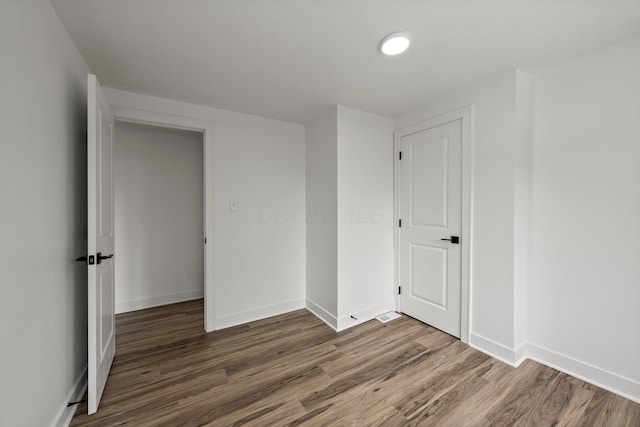 2671 Whitehead Rd, Columbus, OH 43204 - unfurnished room featuring baseboards and wood finished floors