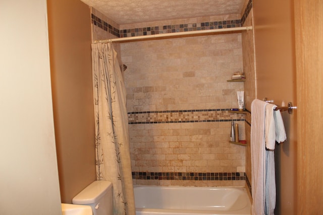 bathroom with toilet and shower / tub combo with curtain
