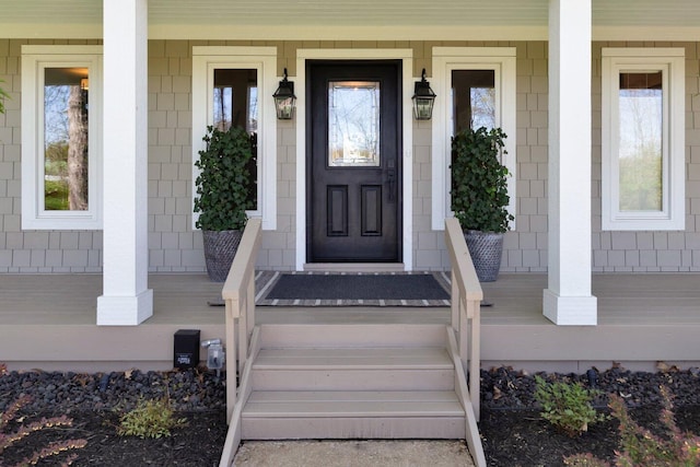 entrance to property with covered porch