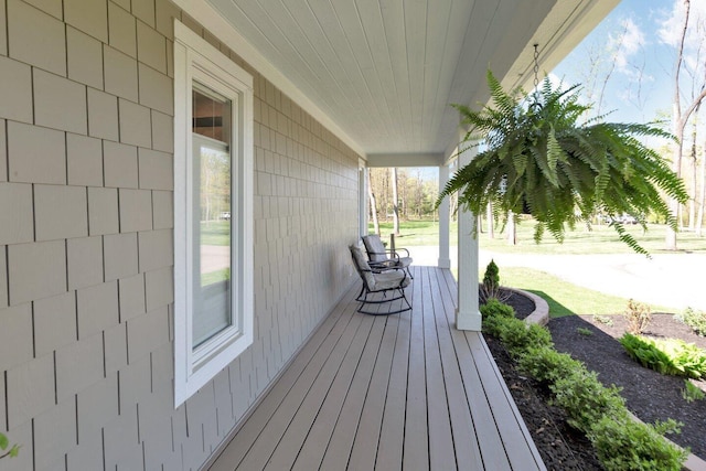 wooden terrace with covered porch