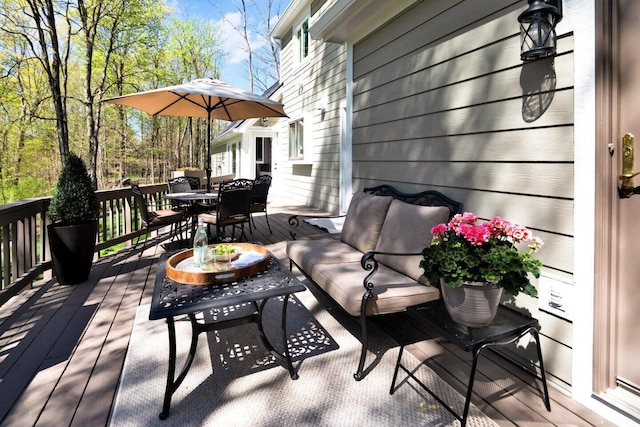 wooden deck featuring outdoor lounge area