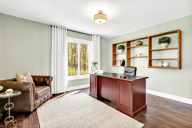 office space featuring baseboards and dark wood-style floors