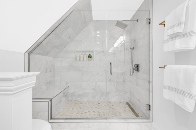 full bathroom featuring a stall shower