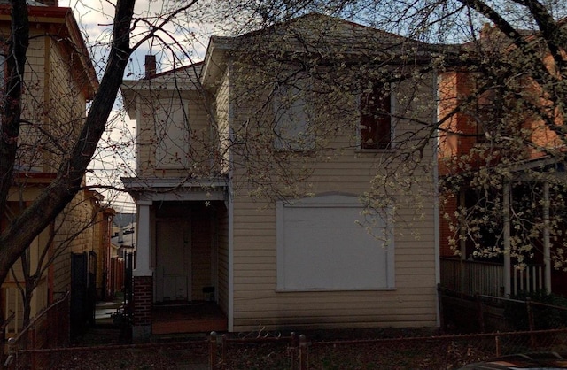 view of front of house with fence