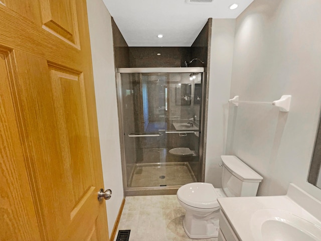 2136 Staghorn Way, Grove City, OH 43123 - bathroom with toilet, a stall shower, vanity, recessed lighting, and tile patterned flooring