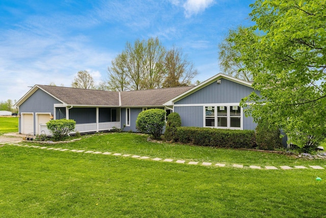 ranch-style house with an attached garage and a front lawn