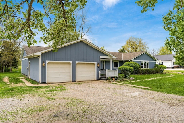 ranch-style home featuring a garage, a front lawn, and dirt driveway