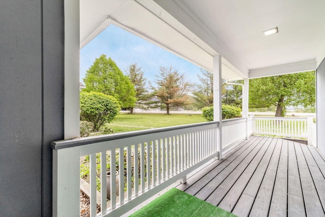 wooden terrace with covered porch