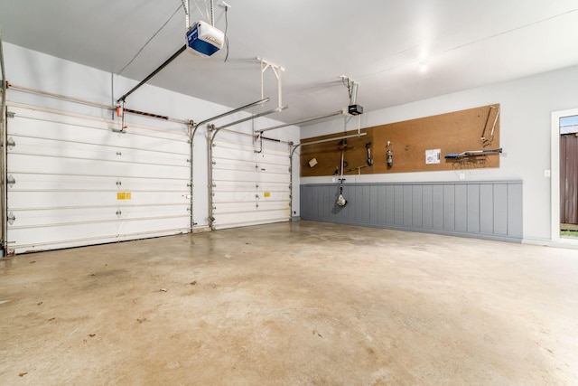 garage featuring a garage door opener