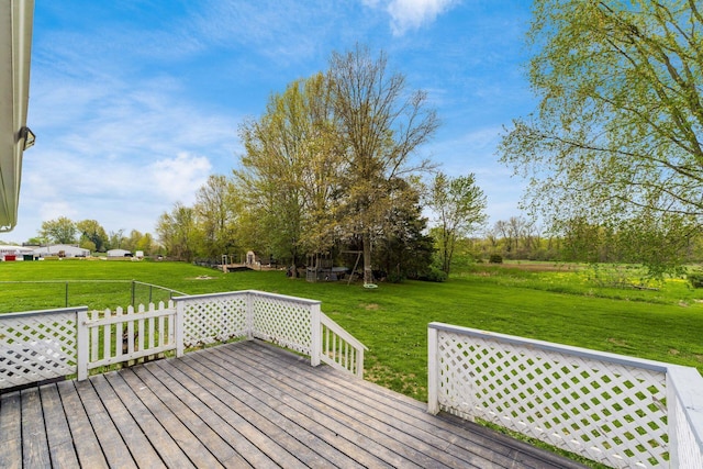 deck featuring a lawn
