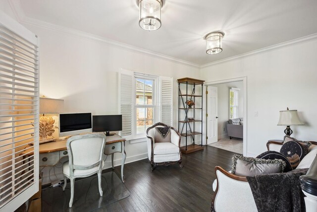 home office featuring crown molding, baseboards, and wood finished floors