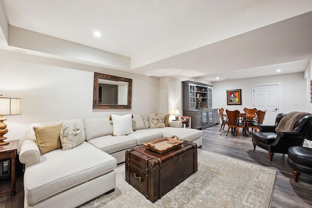 living room with recessed lighting and wood finished floors