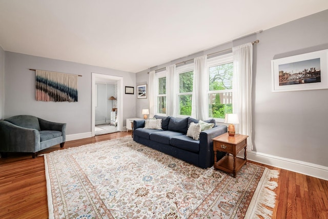 1938 W 5th Ave, Columbus, OH 43212 - living area featuring baseboards and wood finished floors
