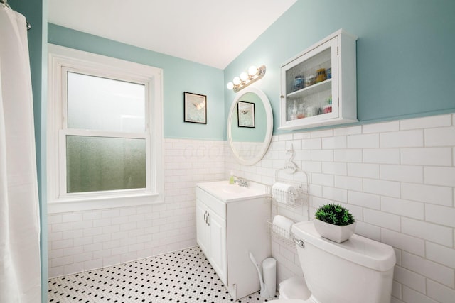 1938 W 5th Ave, Columbus, OH 43212 - full bath with vanity, toilet, wainscoting, and tile walls