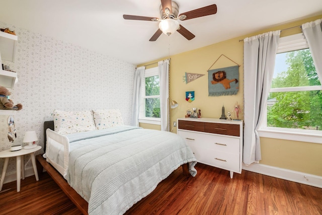 1938 W 5th Ave, Columbus, OH 43212 - bedroom featuring wood finished floors, baseboards, and a ceiling fan