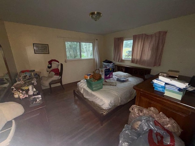 bedroom featuring wood finished floors
