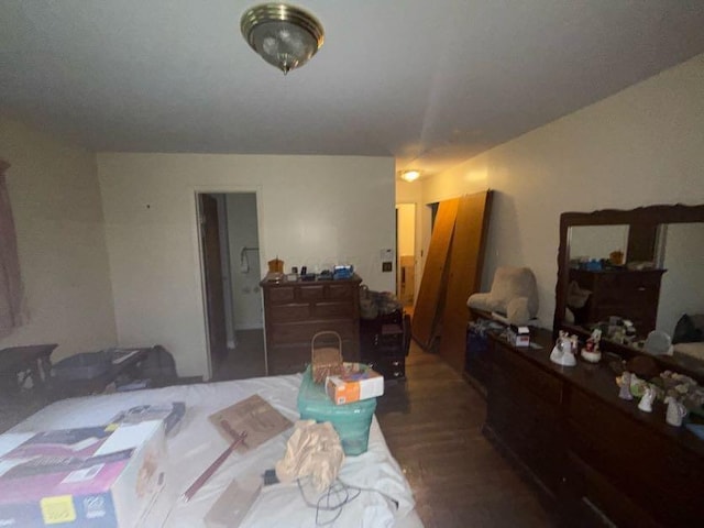 bedroom featuring wood finished floors