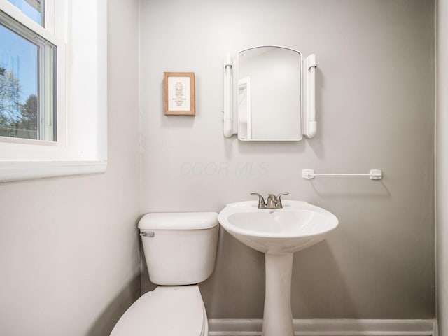 bathroom with a sink and toilet