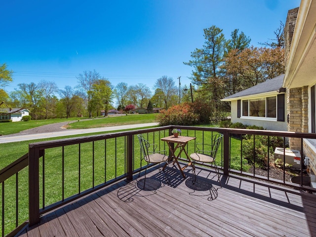 deck featuring a yard