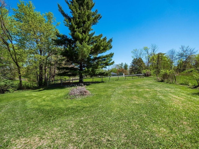 view of yard with fence
