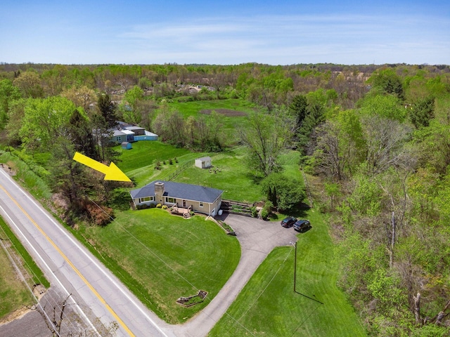 bird's eye view with a forest view