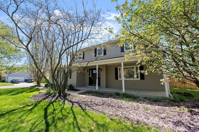 view of front of home featuring a porch and a front yard