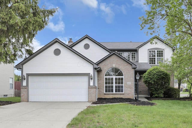 view of front of home with an attached garage, brick siding, driveway, and a front yard