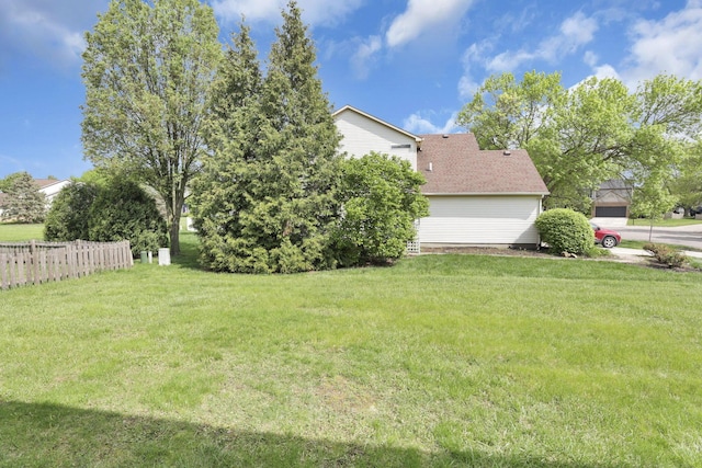 view of yard with fence