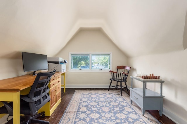 office area featuring baseboards, dark wood-style flooring, and lofted ceiling