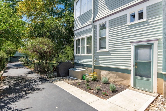view of side of home featuring a patio