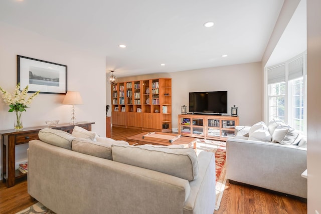 living room featuring recessed lighting and wood finished floors