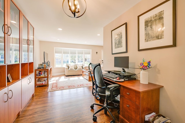 home office with recessed lighting and wood finished floors