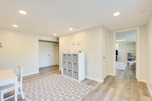 interior space with light wood-style floors, baseboards, recessed lighting, and visible vents