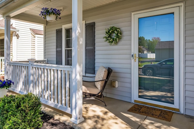 entrance to property with a porch