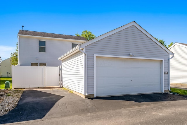 garage featuring fence