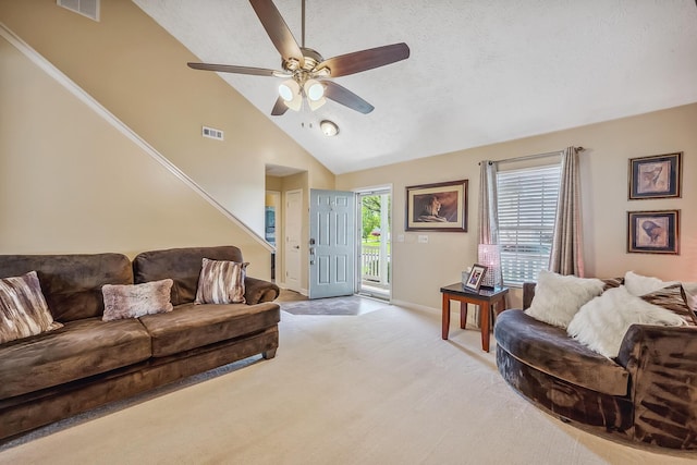 living room featuring baseboards, ceiling fan, light colored carpet, and visible vents