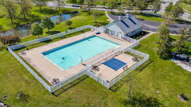 bird's eye view with a water view
