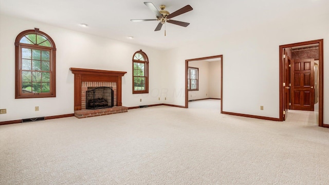 unfurnished living room featuring baseboards, ceiling fan, light carpet, and visible vents