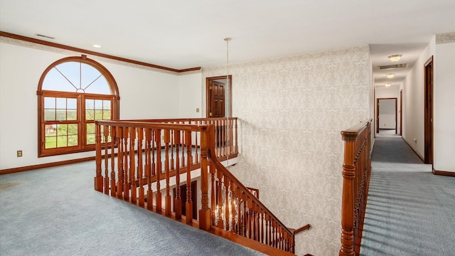 stairway featuring baseboards, carpet, and visible vents