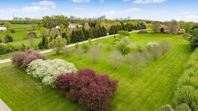 birds eye view of property featuring a rural view
