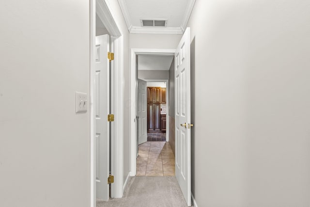 867 Red Oak Trl, Mansfield, OH 44904 - corridor with light colored carpet, baseboards, visible vents, and ornamental molding