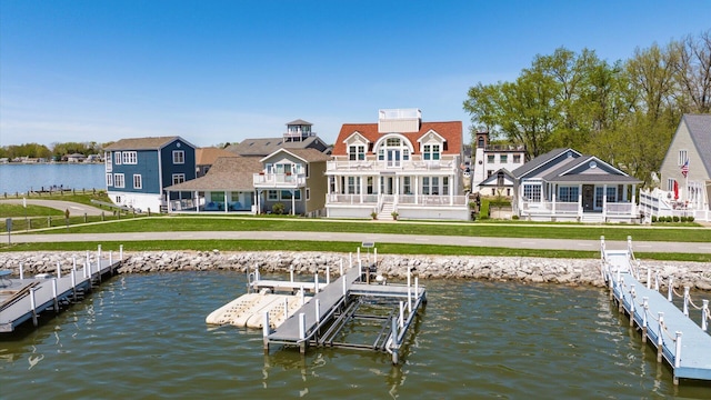 3555 Sellers Dr NE, Millersport, OH 43046 - back of property with a water view, boat lift, and a lawn