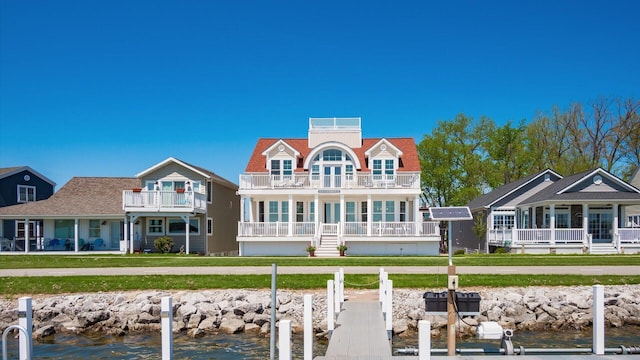 3555 Sellers Dr NE, Millersport, OH 43046 - back of property with a balcony, a water view, and a yard