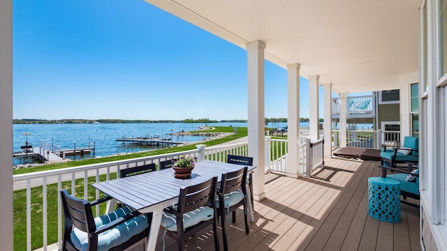 3555 Sellers Dr NE, Millersport, OH 43046 - deck with a water view, outdoor dining area, and a boat dock