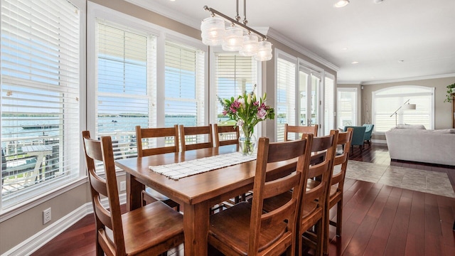 3555 Sellers Dr NE, Millersport, OH 43046 - dining space featuring ornamental molding, dark wood finished floors, baseboards, arched walkways, and recessed lighting