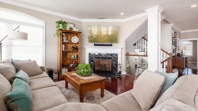 3555 Sellers Dr NE, Millersport, OH 43046 - living area featuring wood finished floors, crown molding, stairs, a fireplace, and baseboards