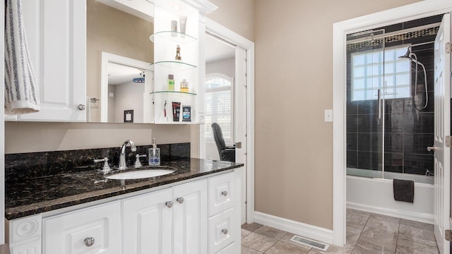 3555 Sellers Dr NE, Millersport, OH 43046 - bathroom featuring vanity, healthy amount of natural light, baseboards, and shower / bath combination